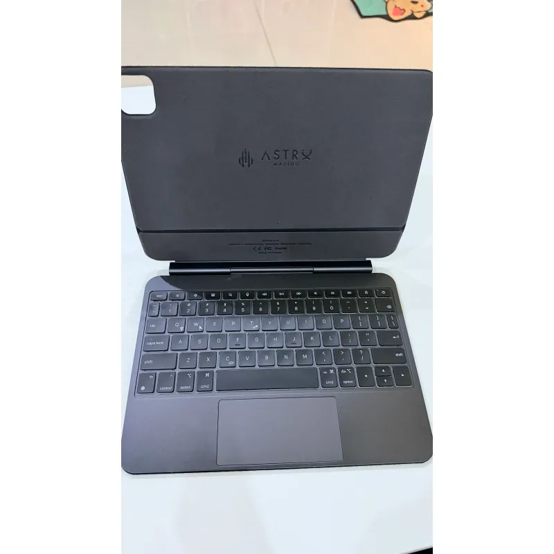 Máy tính xách tay Astronic A1000 bạc, bàn phím số, trạng thái Like New 1036798