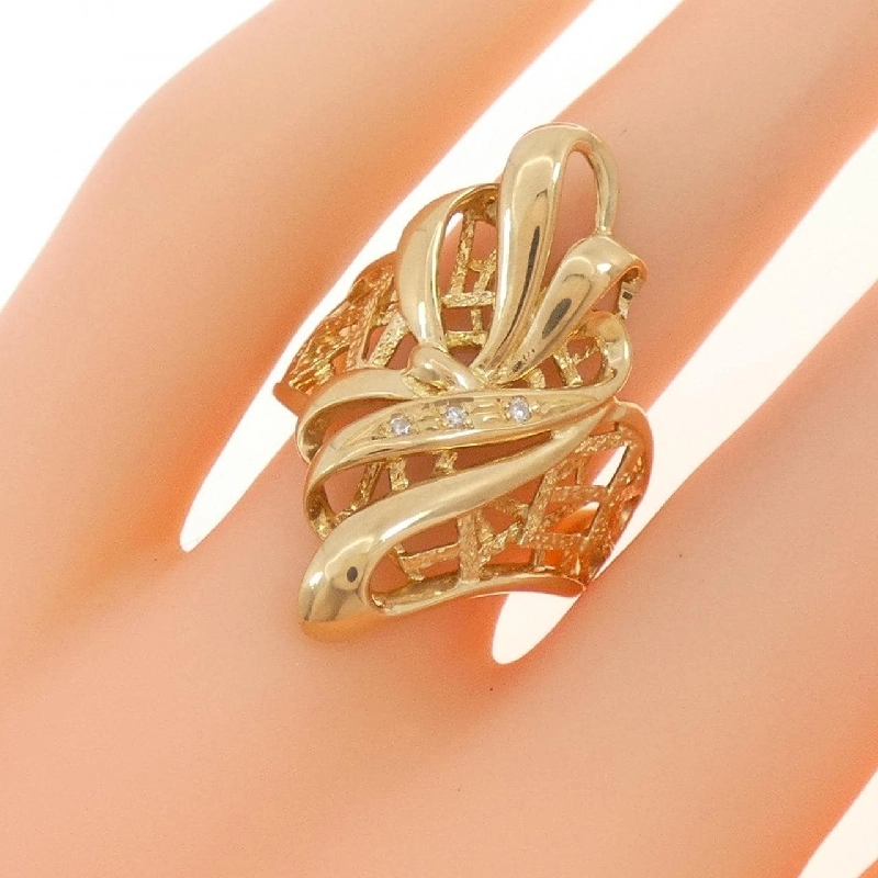 Nhẫn kim cương ba viên K18YG 672135