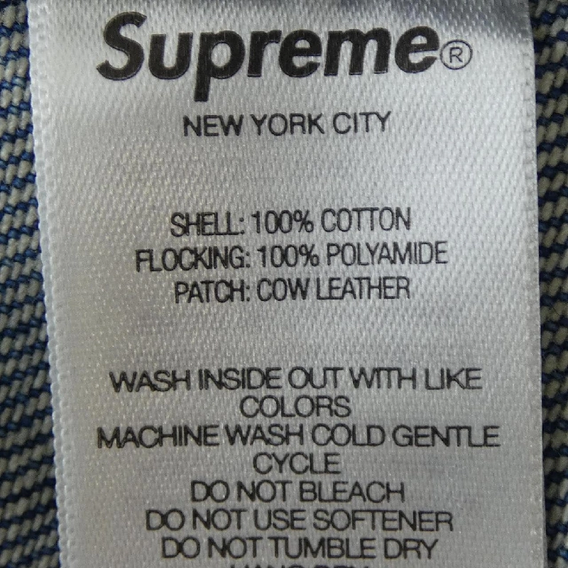 Áo khoác denim FLOCKED DENIM TRUCKER của SUPREME - Hàng hiệu Authentic 888215