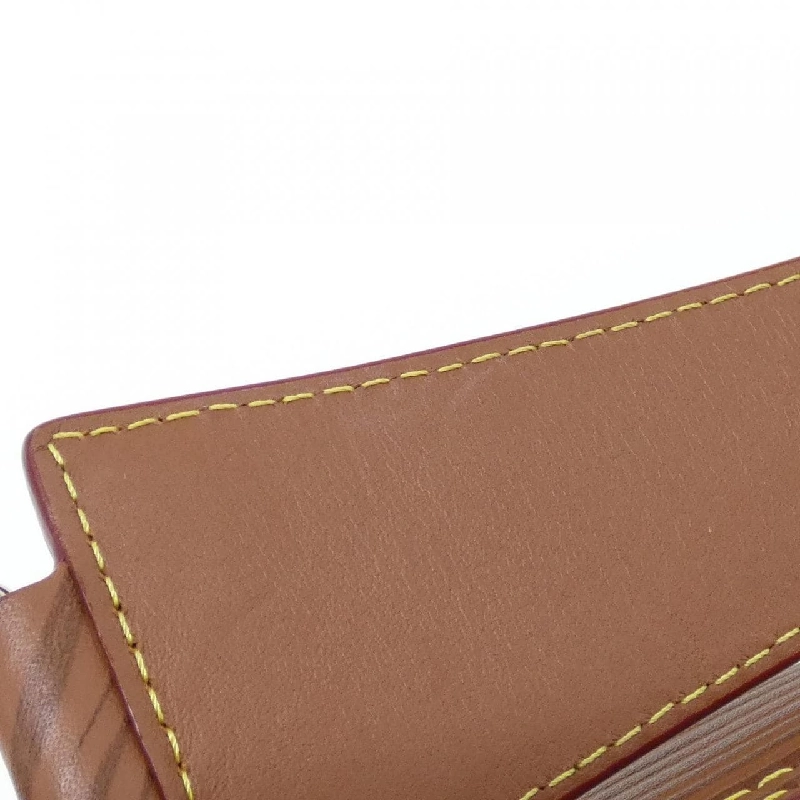 Túi đeo vai Louis Vuitton Epi XL Soft Polochon M23092 608953