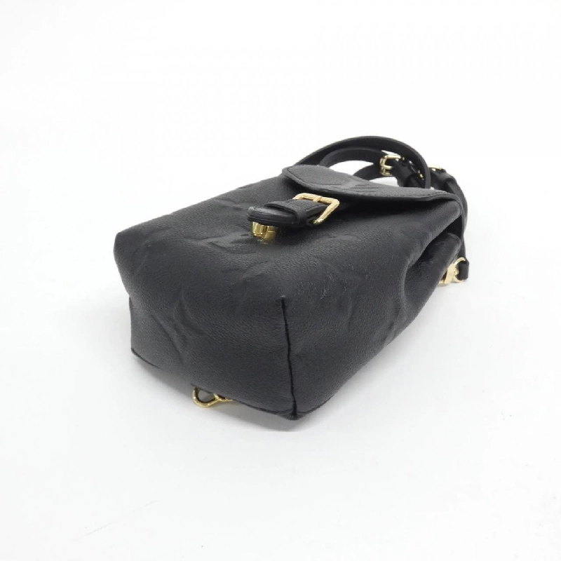 Ba lô Tiny Monogram Empreinte Louis Vuitton M80596 611183