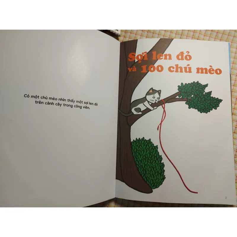 SỢI LEN ĐỎ VÀ 100 CHÚ MÈO - Tomoko Omura 782527