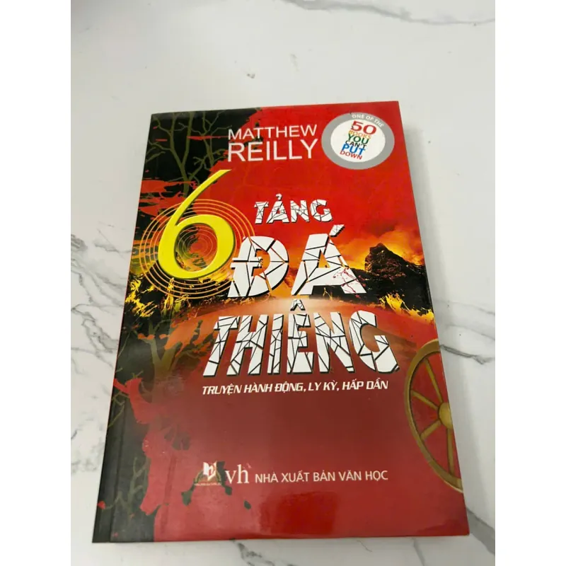 6 TẢNG ĐÁ THIÊNG - MATTHEW REILLY 605583
