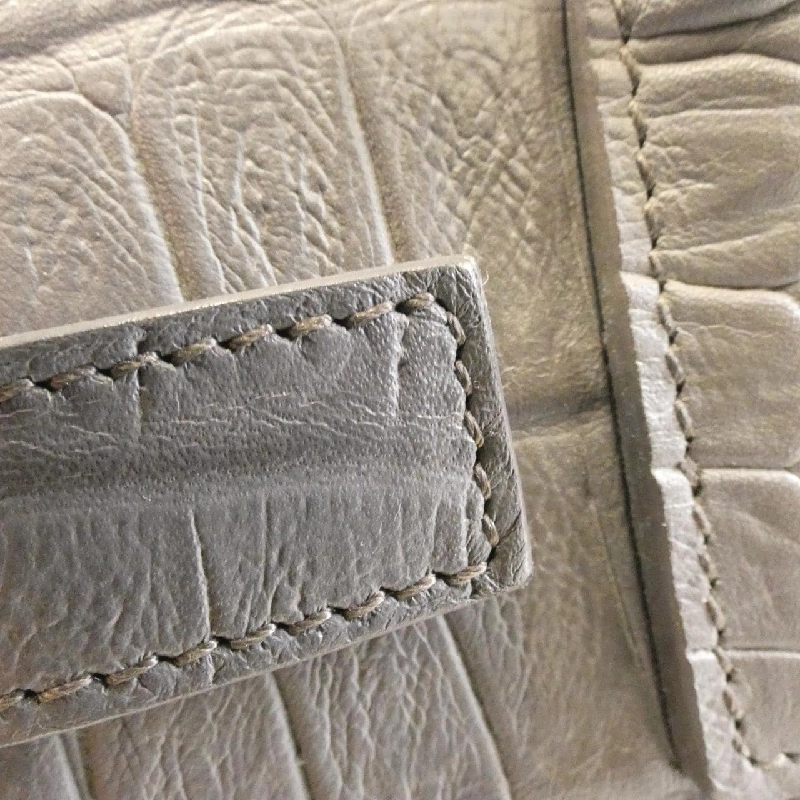 Túi xách Baby Sac de Jour 340778 DAY0J của Saint Laurent 616086