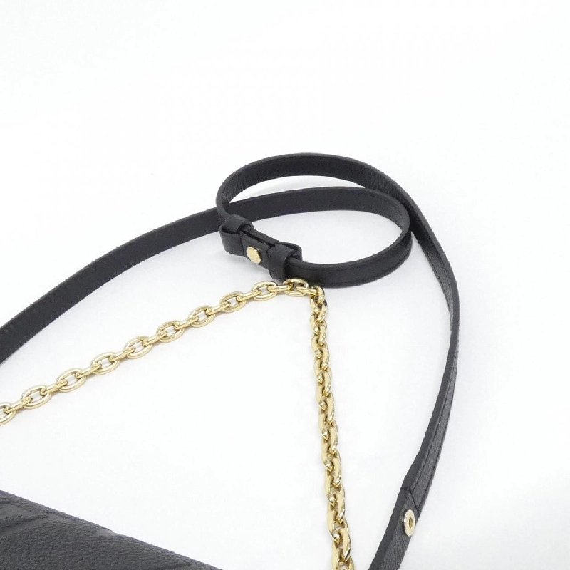 Ví đeo chéo Louis Vuitton Monogram Empreinte Ivy M82154 611529