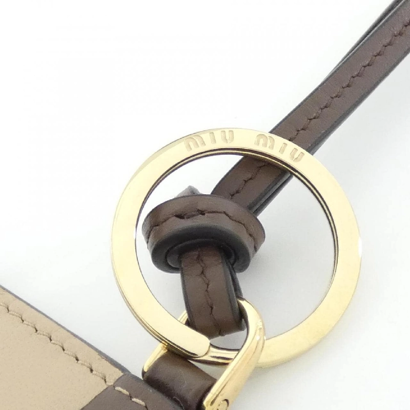 Miu Miu 5TL531 Charm - Hàng hiệu Chính hãng 774768