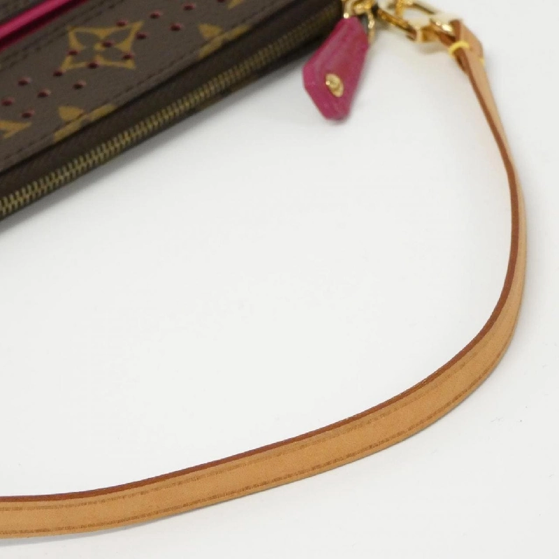 Túi đeo chéo Louis Vuitton Monogram Perforated Pochette Accessoires M95183 621105