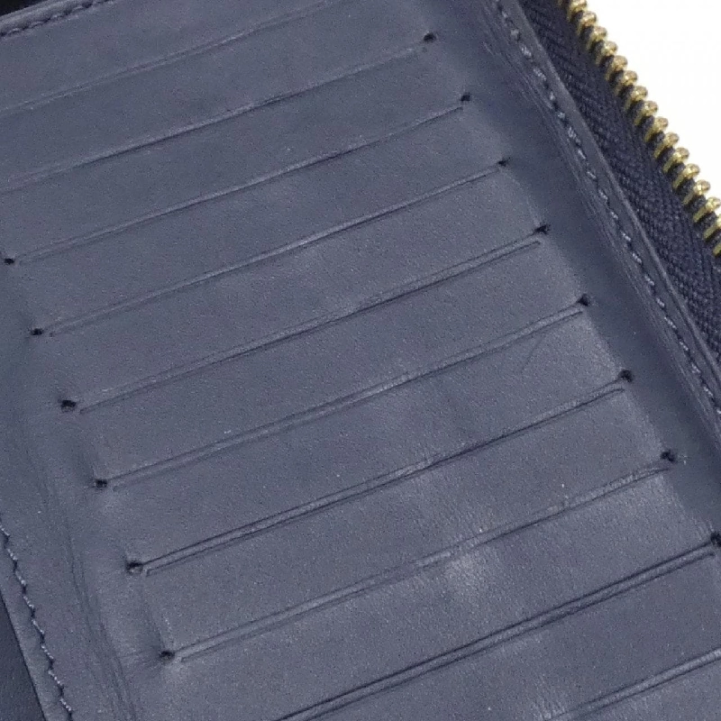 Ví Zippy Vertical Monogram Drip Louis Vuitton M81107 621288