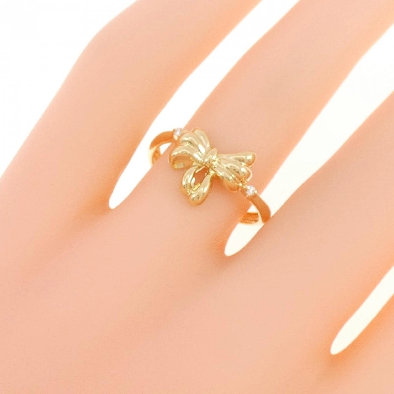 Nhẫn kim cương K18YG hình ruy băng 0.02CT 671028