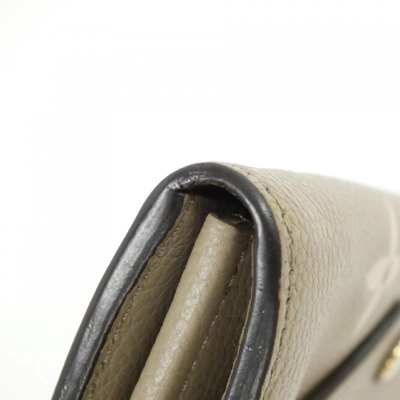 Ví Louis Vuitton hai màu Monogram Empreinte Portefeuille Sarah M81049 622800