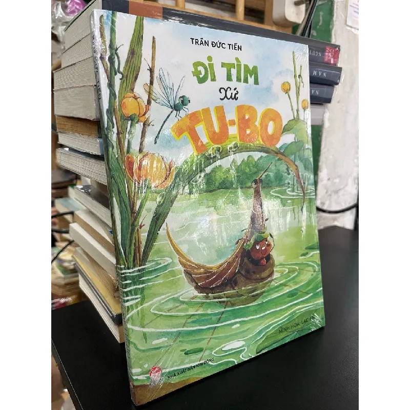Đi tìm xứ tu-bo - Trần Đức Tiến 674464
