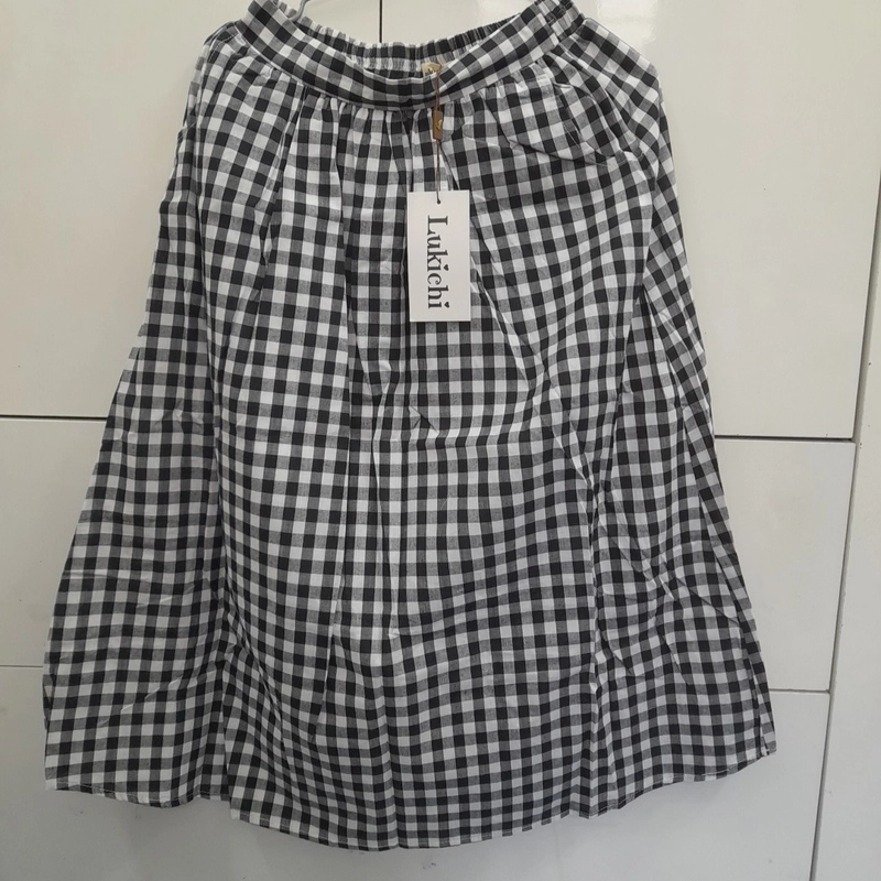 Chân váy kẻ caro Size XL nhưng thực size chỉ L hoặc M thôi 411088