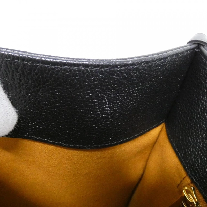 Túi xách Louis Vuitton Monogram Empreinte OnTheGo MM M45595 - Hàng hiệu Chính hãng 771627