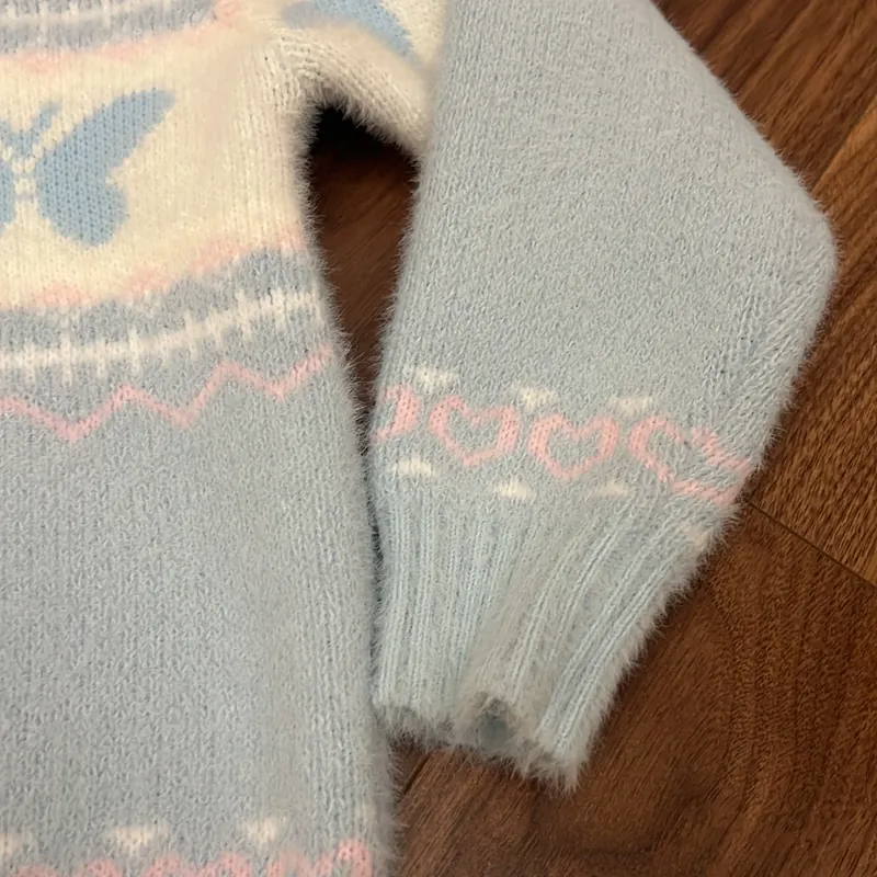 Áo len lông bé gái CN size 140 màu xanh nhạt ít mặc 689516