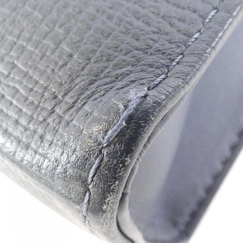 Túi xách Louis Vuitton Monogram Drip Pochette Voyage M45961 619942