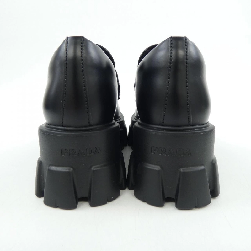 Giày lười Monolis Triangle Logo PRADA 1D649M - Hàng hiệu Authentic 827971