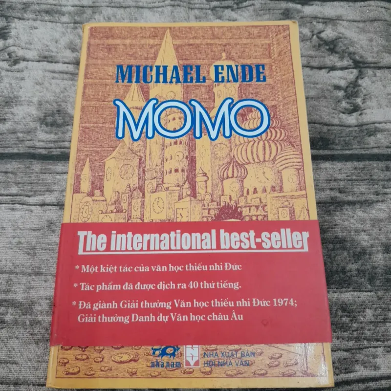 Tiểu thuyết MOMMO- Câu chuyện Cô bé giành lại thời gian. Tg Michael Ende 775925
