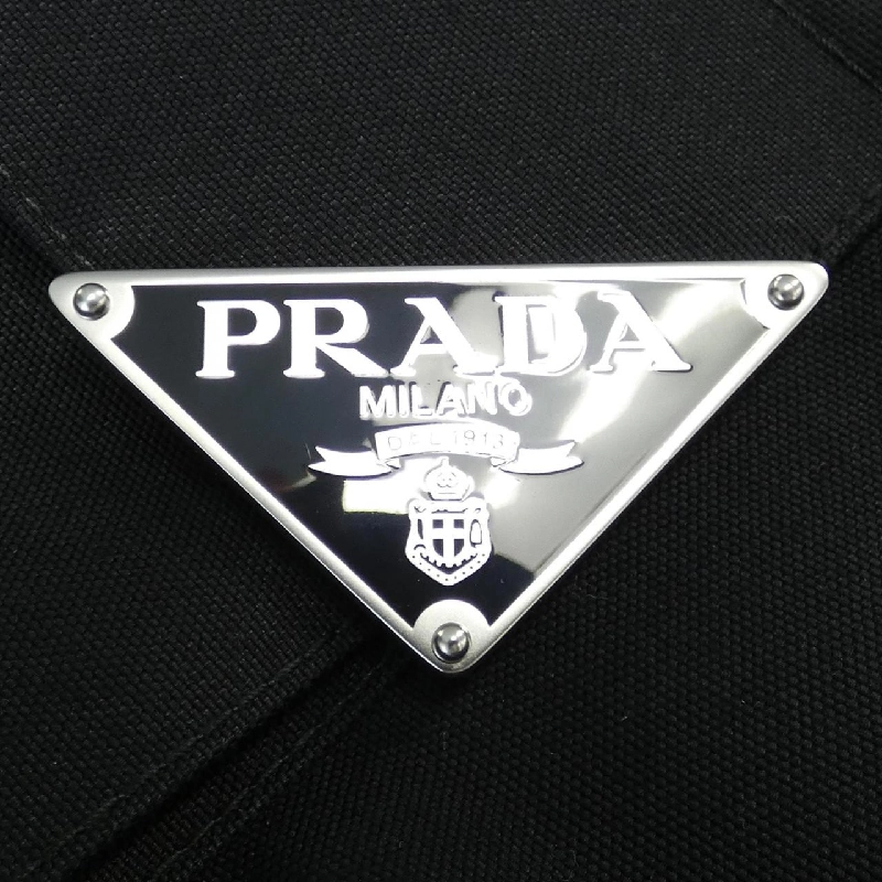 Váy hình tam giác logo kỹ thuật PRADA 21H940 S231 11HJ 647529