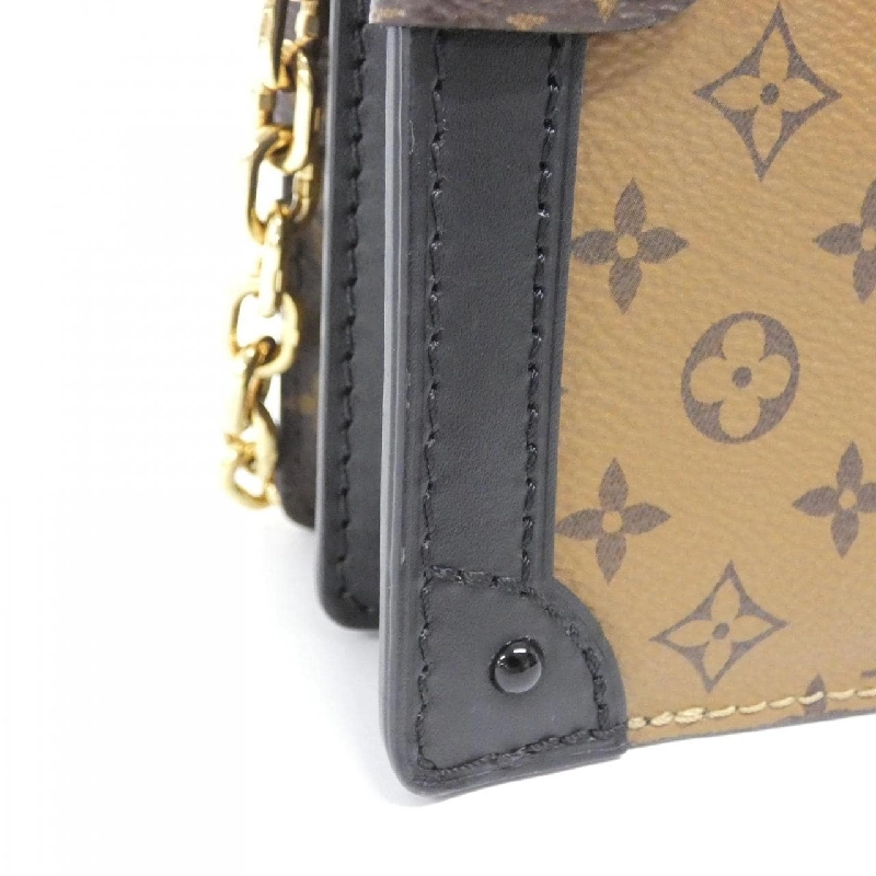 Túi xách vai Louis Vuitton Monogram Reverse Trunk Clutch M43596 608863