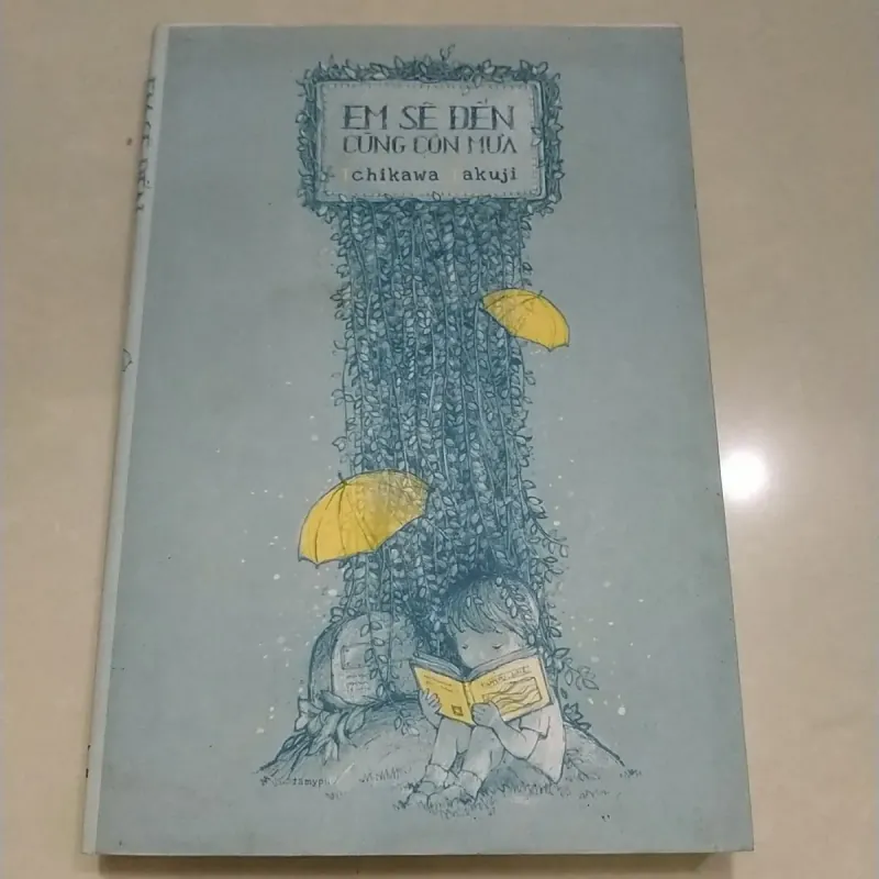 Sách Cũ - Em sẽ đến cùng cơn mưa 1041755