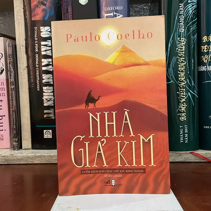 II Tiểu Thuyết: Nhà Giả Kim - Paulo Coelho - Lê Chu Cầu (Dịch) - 2018 538260