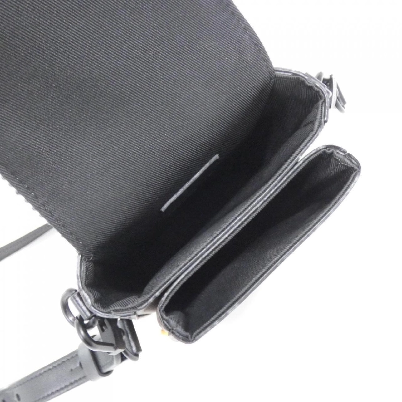 Túi đeo vai Louis Vuitton Monogram Macassar S-Lock Vertical Wearable Wallet M82535 612710