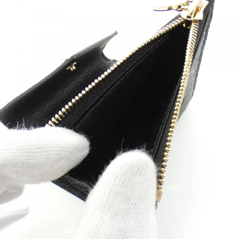 Ví Louis Vuitton Monogram Empreinte Portefeuille Zoé M62935 621590