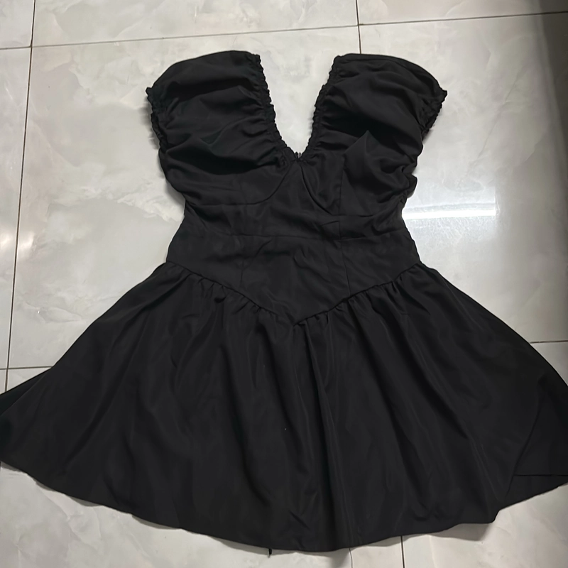 Thanh lý | Váy đen chun co giãn freesize <65kg 544466