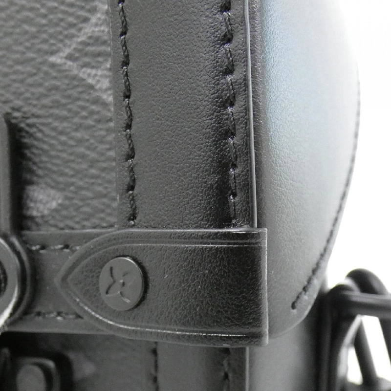 Túi xách vai Louis Vuitton Monogram Eclipse Vertical Trunk Wearable Wallet M82077 - Hàng hiệu Chính hãng 766925