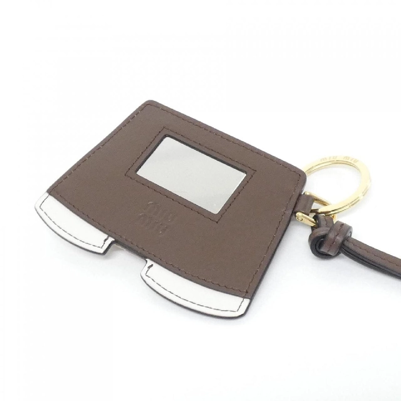 Miu Miu 5TL531 Charm - Hàng hiệu Chính hãng 774768
