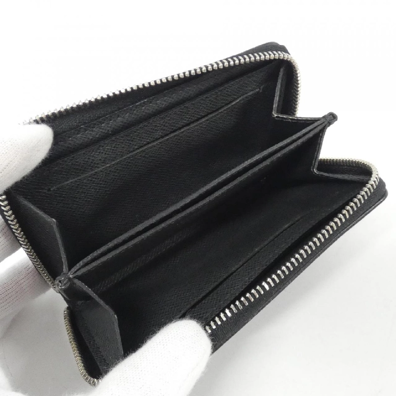 Ví tiền xu Louis Vuitton Taiga Zippy M32832 - Hàng hiệu chính hãng 769114