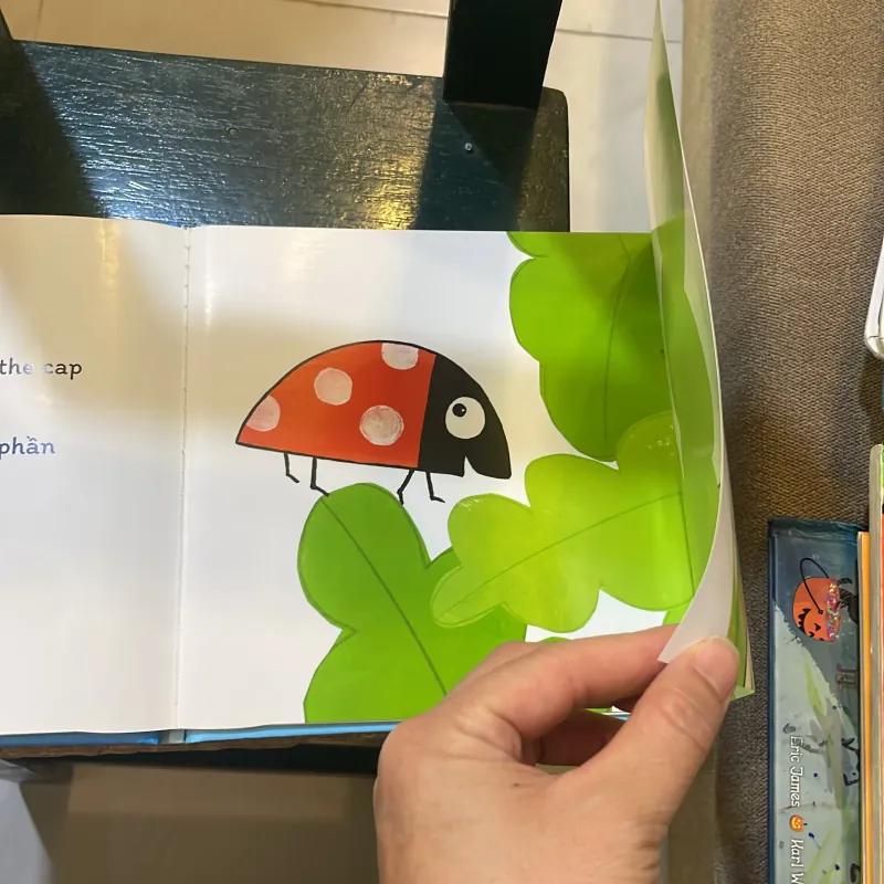 Sách đố vui lật giở song ngữ : Đoán xem là gì ? - Guido Van Genechten  1027410