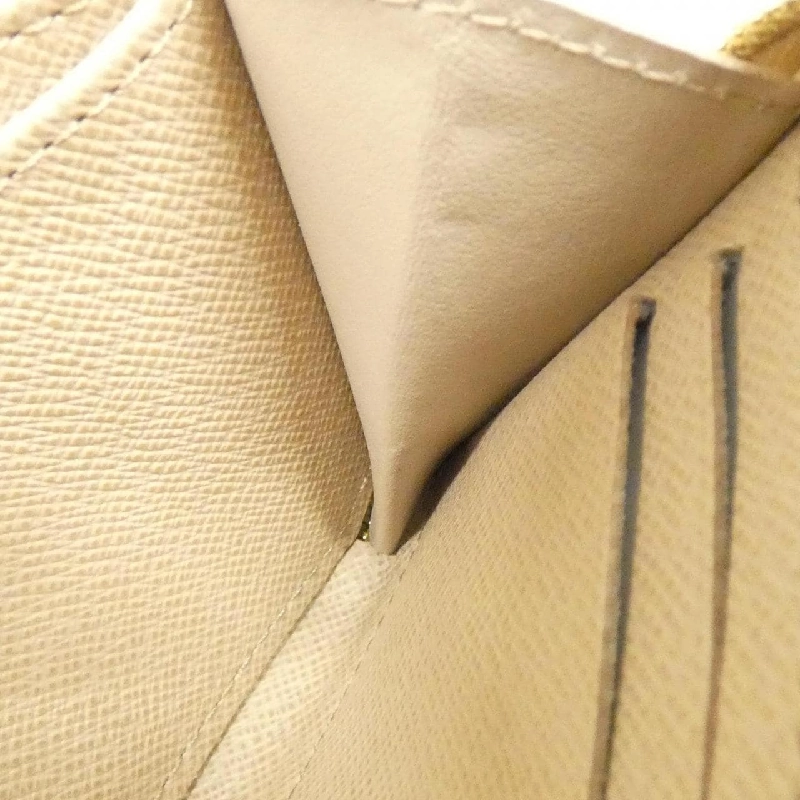 Ví tiền xu Louis Vuitton Monogram Laminated Jacquard Zippy M82483 621295