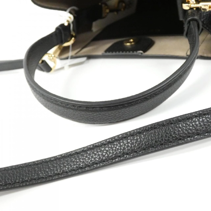 Túi xách nhỏ Bucket Mack Glow của Tory Burch 158500 - Hàng hiệu Authentic 768924