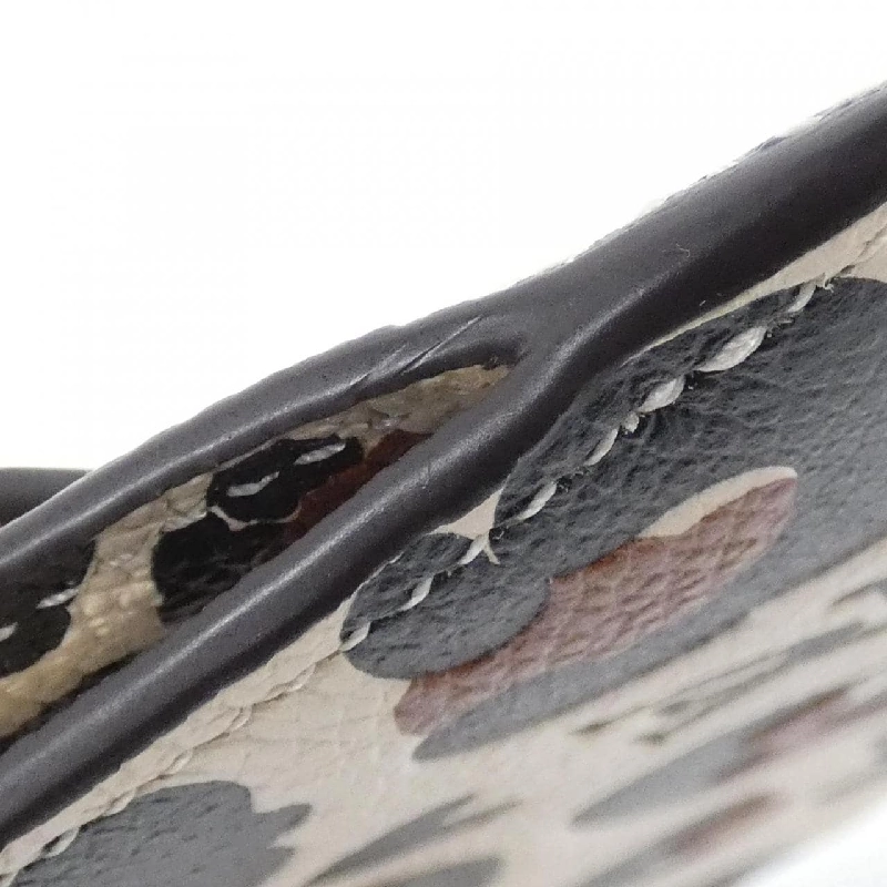 Túi đeo chéo Louis Vuitton Monogram Empreinte (Wild at Heart) Pochette Clé M80692 - Hàng hiệu Authentic 806065