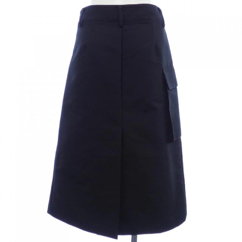 Váy hình tam giác logo kỹ thuật PRADA 21H940 S231 11HJ 647529