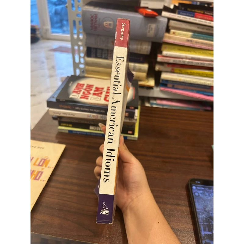 Essential American Idioms - NTC Publishing Group 1000736