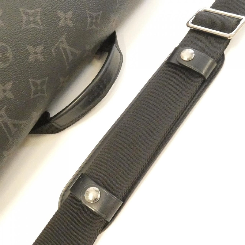Túi đeo chéo Louis Vuitton Monogram Eclipse Voyage MM M40510 609842