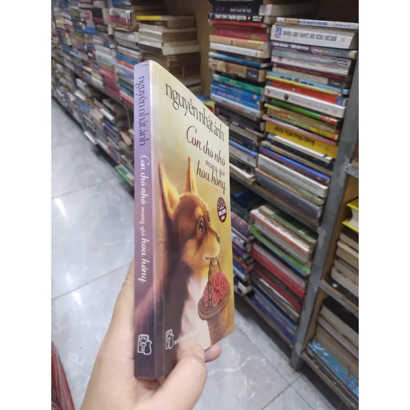 Sách: Con chó nhỏ mang giỏ hoa hồng (B1) 717540