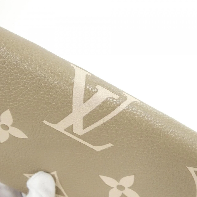 Ví Louis Vuitton hai màu Monogram Empreinte Portefeuille Sarah M81049 622800