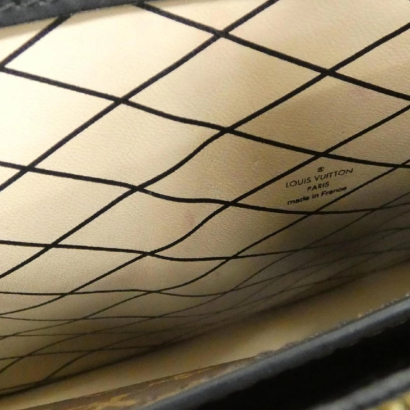 Túi xách đeo vai Louis Vuitton Monogram Reverse Trunk Clutch M43596 - Hàng hiệu Authentic 802693