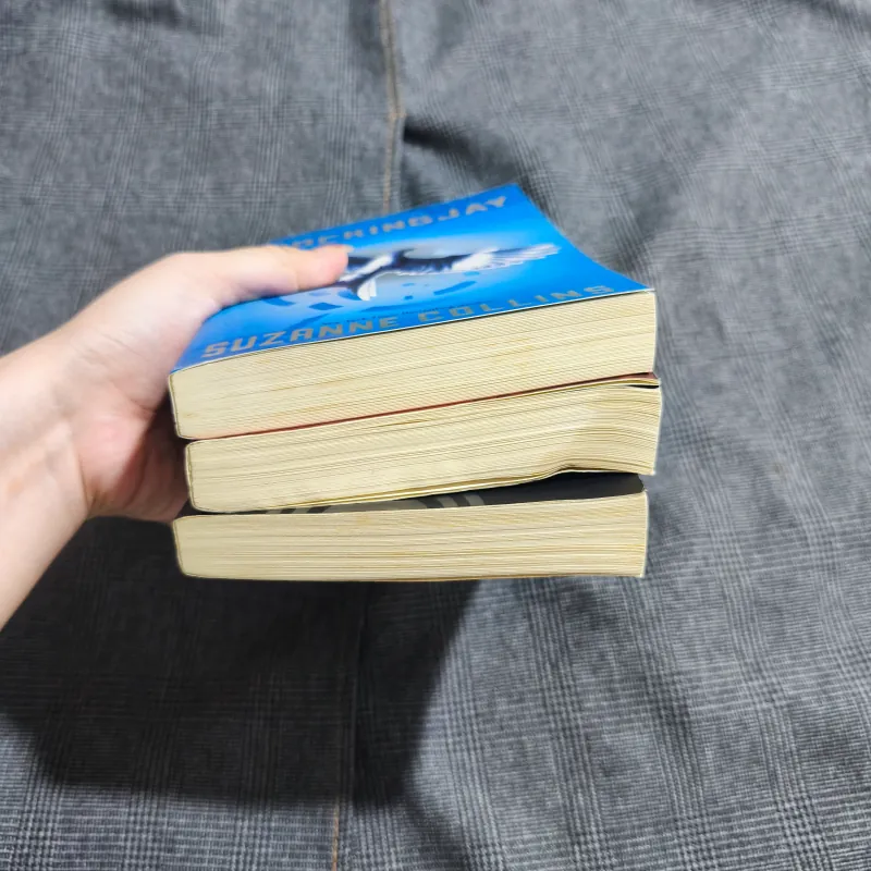 The Hunger Games + Catching Fire + Mockingjay - Suzanne Collins 777859