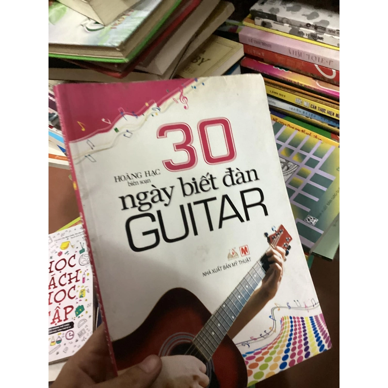 Sách 30 ngày biết đàn Guitar 312539