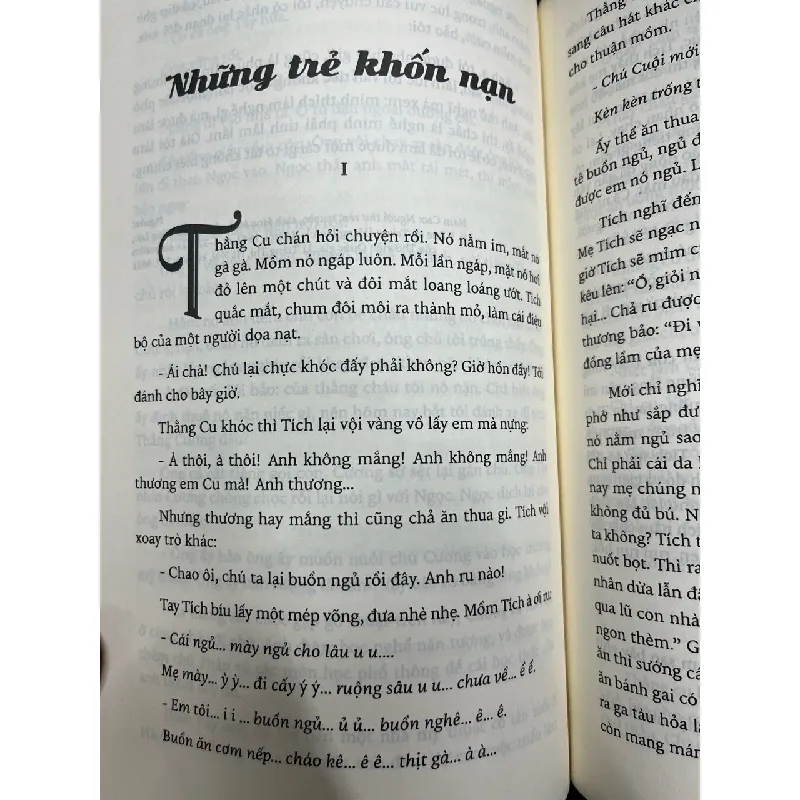 Con mèo mắt ngọc - Nam Cao 693408