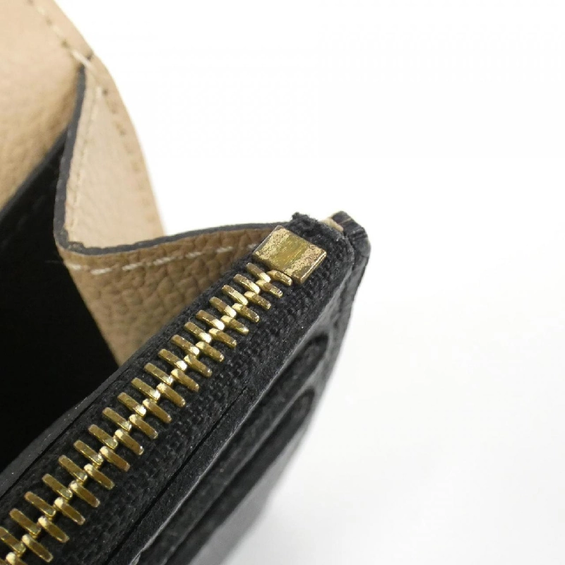 Ví Louis Vuitton Monogram Empreinte Portefeuille Émilie M62369 - Hàng hiệu Authentic 770594