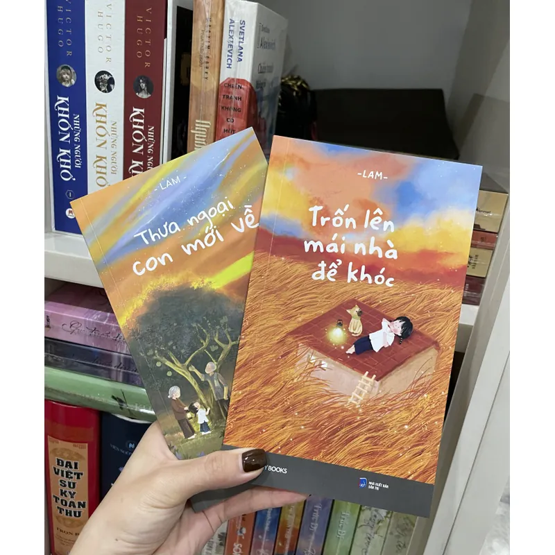 Combo 2 cuốn “Trốn lên mái nhà để khóc” và “Thưa ngoại con mới về” - Lam (mới 99%) 690507