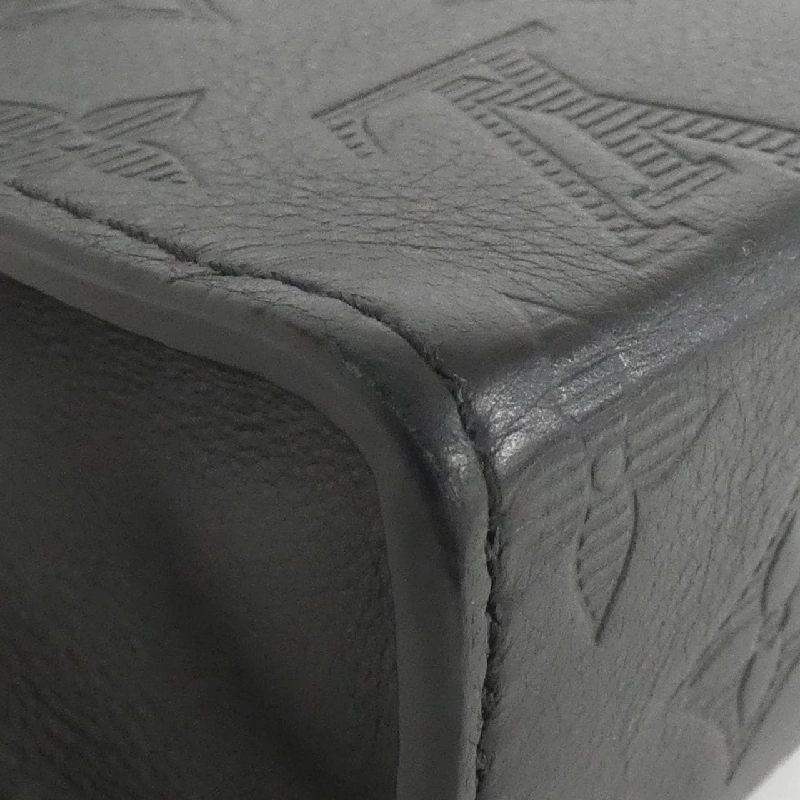 Túi đeo vai Louis Vuitton Monogram Shadow Gaston Wearable Wallet M81115 609578