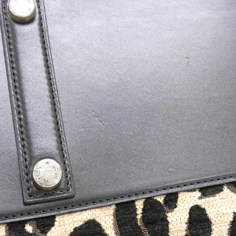 Túi xách Boston Louis Vuitton Leopard Speedy PM M97396 614505