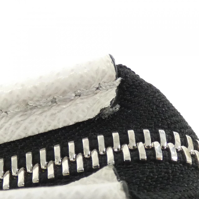 Túi đeo vai Louis Vuitton Taiga Rama Gaston Wearable Wallet M30935 613686