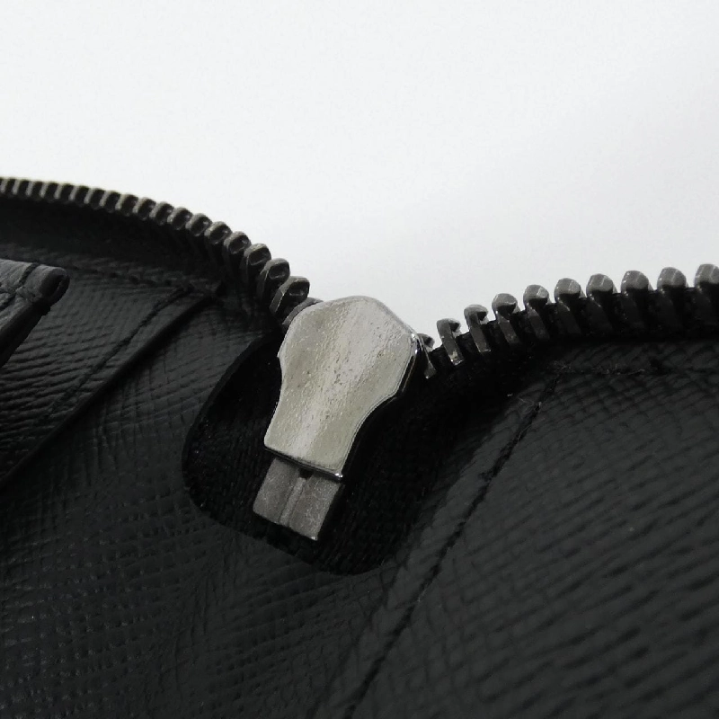 Ví Louis Vuitton Monogram Eclipse Zippy Wallet Vertical M62295 621221